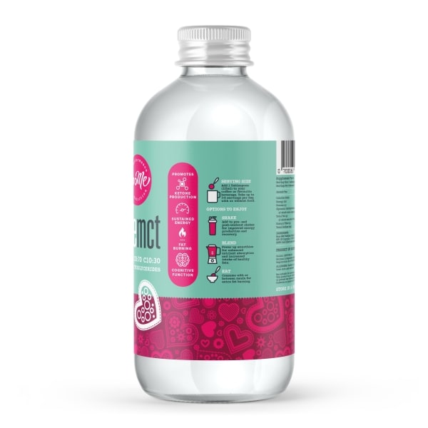 The front view of a MojoMe pure MCT Oil bottle displays vibrant turquoise and pink labelling with bold white and magenta text. The label reads 'pure MCT OIL C8:70 C10:30 MEDIUM CHAIN TRIGLYCERIDES', emphasising the product's key ingredient. Icons indicating the product's benefits for promoting ketone production and sustained energy are visible. The design includes a whimsical heart and swirl patterns, reinforcing the health-focused branding
