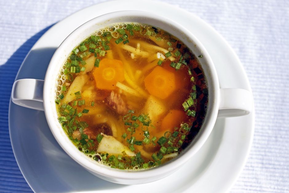 bone broth in a mug, warm, digestive health, traditional remedy